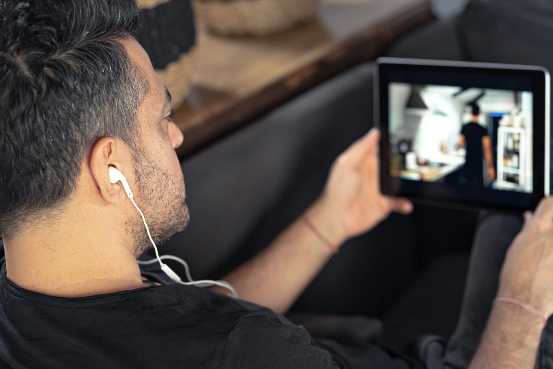 man hand holding using digital tablet watching onl 2024 12 04 06 29 24 utc